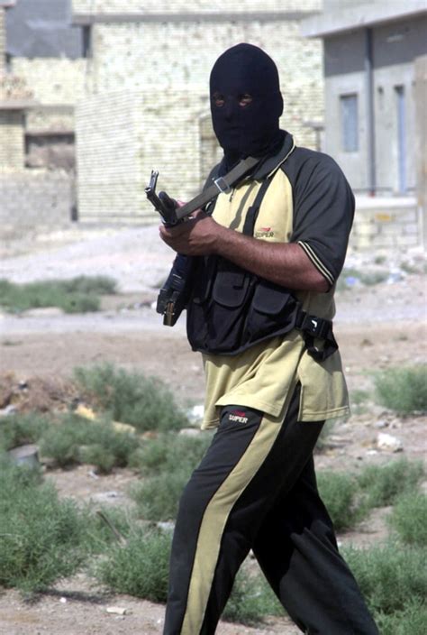 Insurgent fighters in Fallujah